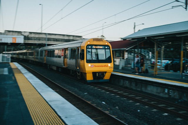 https://www.pexels.com/photo/train-arriving-at-a-station-9993828/
