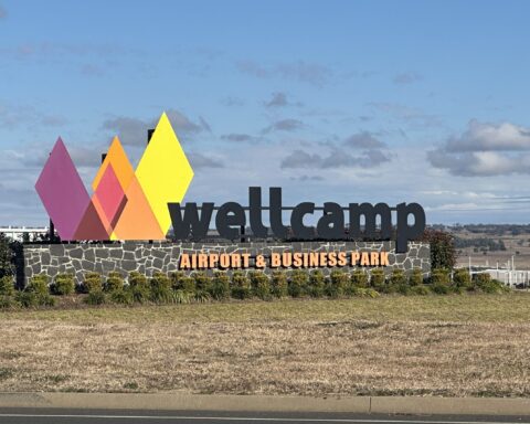 Wellcamp logo sign