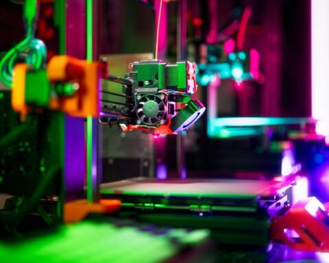 https://unsplash.com/photos/a-close-up-of-a-machine-with-lights-in-the-background--m8nNr_E39I