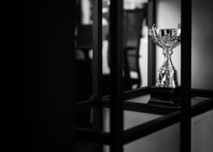 https://unsplash.com/photos/a-silver-trophy-sitting-on-top-of-a-table-w8snfgbEmRY