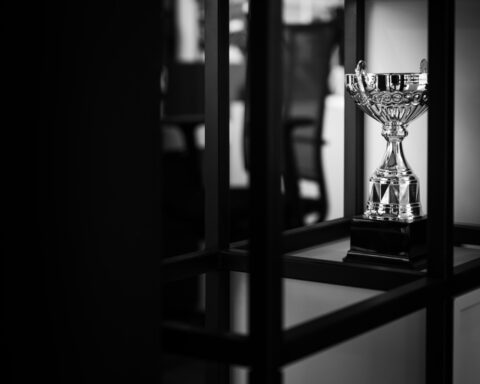 https://unsplash.com/photos/a-silver-trophy-sitting-on-top-of-a-table-w8snfgbEmRY